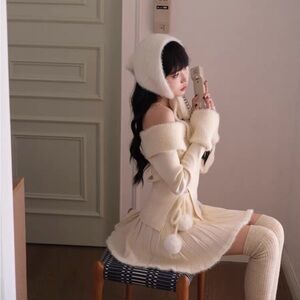 Cream Knit Pleated Mini Skirt with Pom-Pom Waist Detail